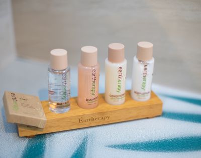 Four small bottles labeled 