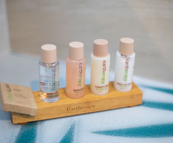 Four small bottles labeled 