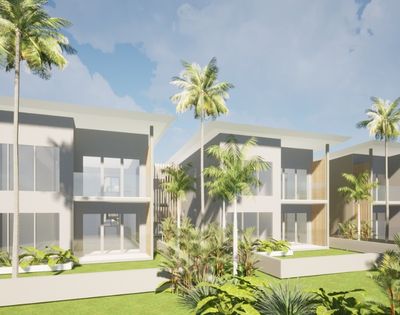 Architectural rendering of modern, multi-story villas with large windows, balconies, and tropical landscaping, featuring palm trees under a bright sky.
