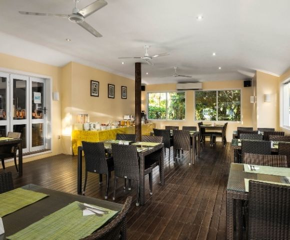 Indoor dining room with neatly arranged tables and chairs