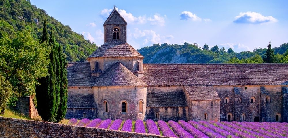 Lavender fields and historic abbey in the Provence countryside