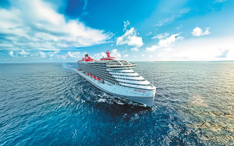 A large white cruise ship named 