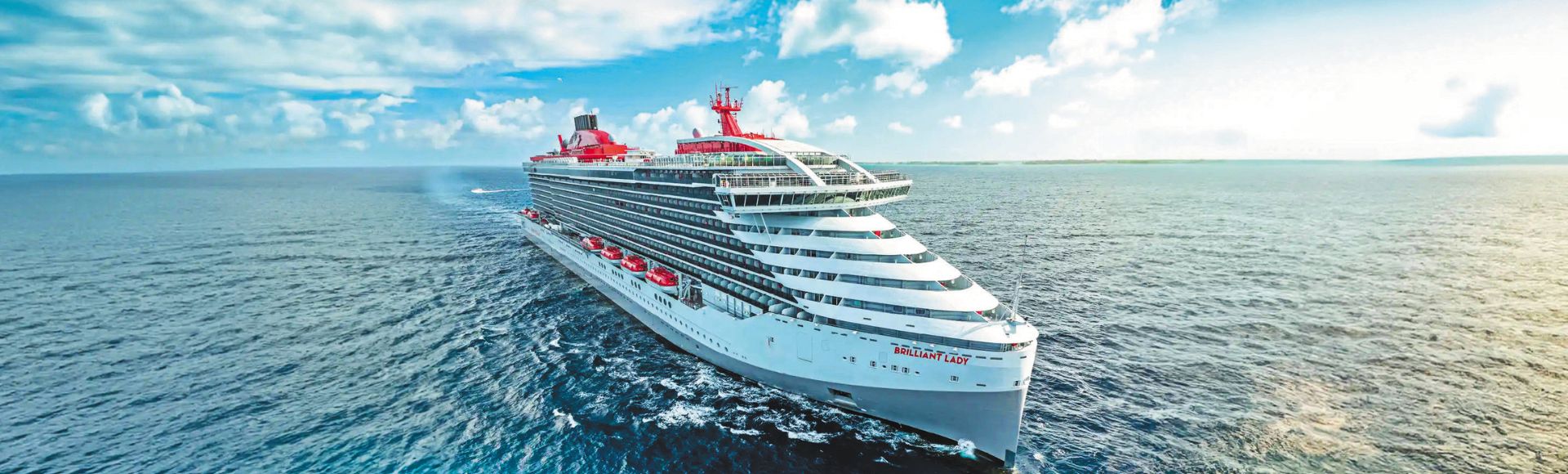 A large white cruise ship named 