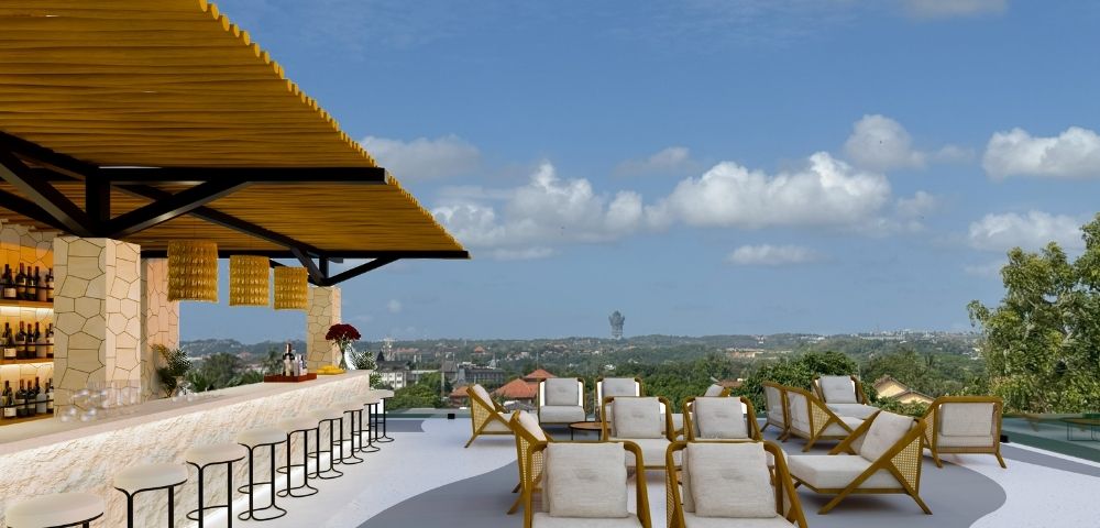 Open-air rooftop bar with lounge seating, bar stools, and panoramic views under a clear blue sky
