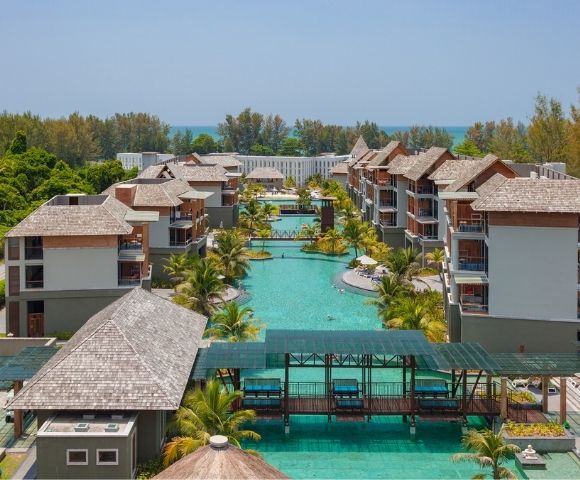 Elevated view of resort buildings, pools, and landscaped grounds