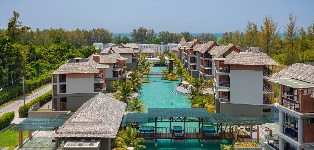 Elevated view of resort buildings, pools, and landscaped grounds