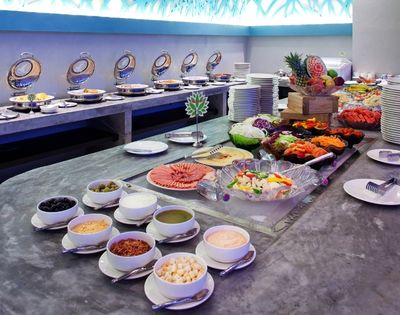 Buffet spread featuring a variety of dishes and desserts