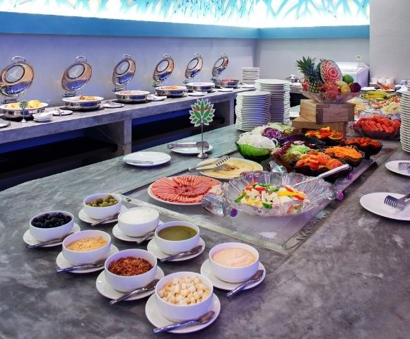 Buffet spread featuring a variety of dishes and desserts