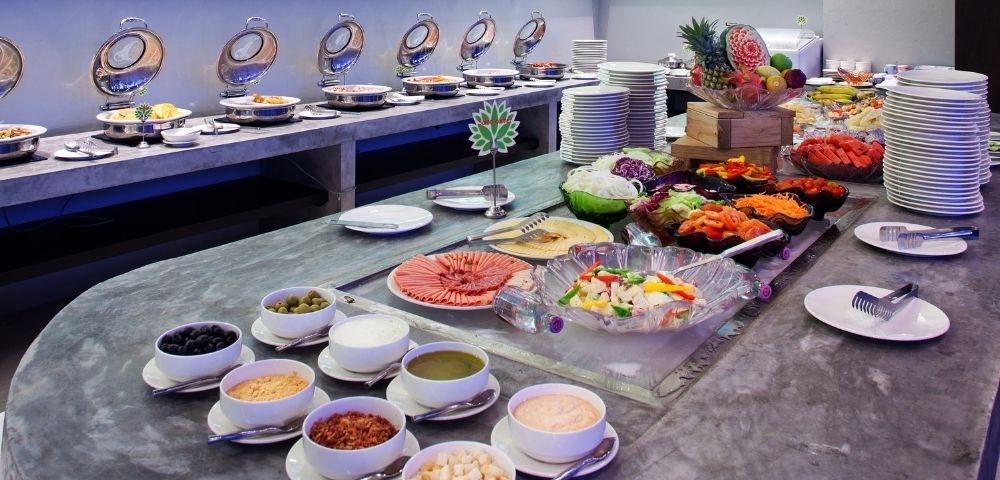 Buffet spread featuring a variety of dishes and desserts