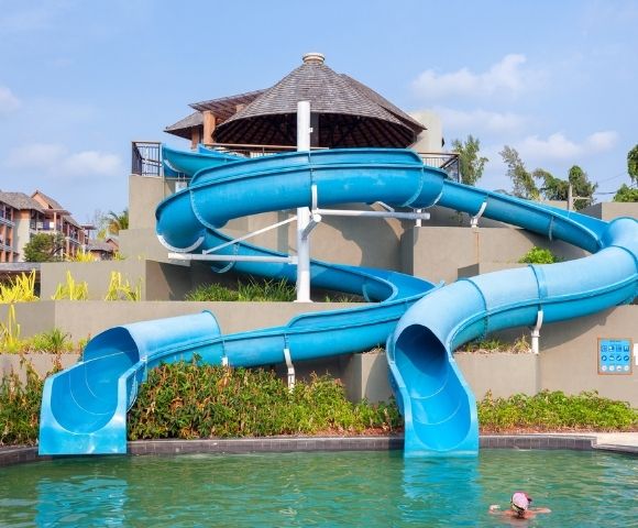 Family-friendly water park with multiple slides, pools, and play attractions