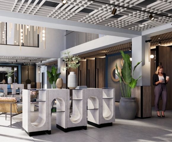 A modern hotel lobby featuring stylish seating arrangements, large potted plants, decorative lighting, and contemporary design elements.