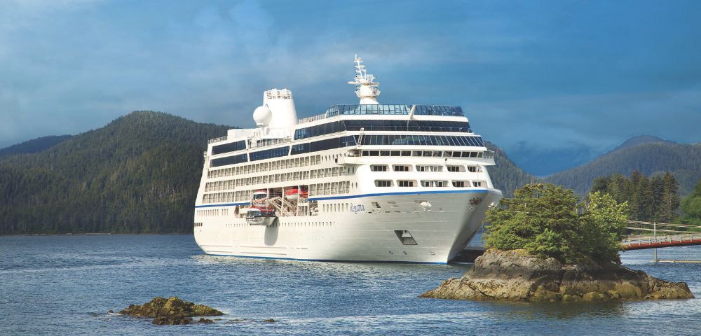 A large white cruise ship named 