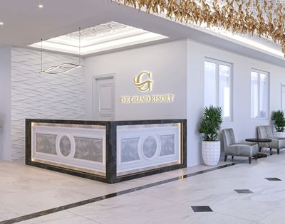 A sleek, modern reception area with a curved front desk featuring decorative paneling and ambient lighting, a textured wave-patterned wall, and the 