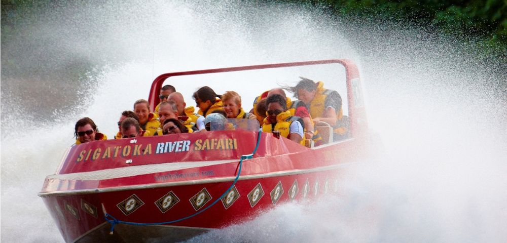 A red speedboat, labeled 