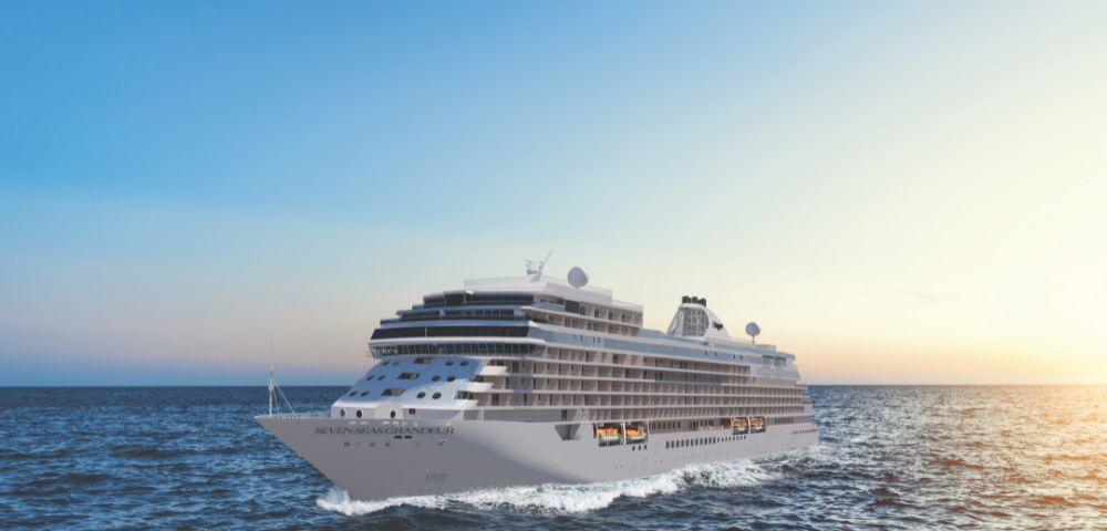 A large white cruise ship named 