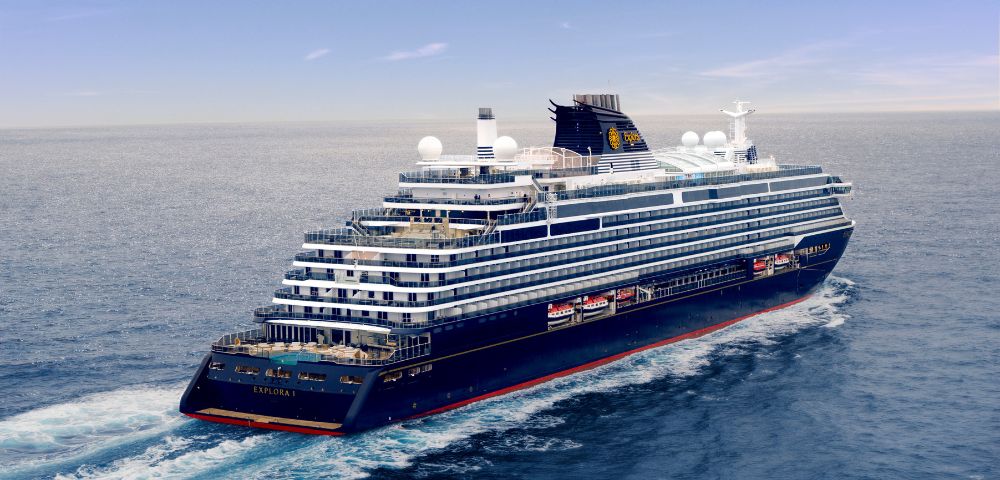 A large, dark blue cruise ship named 